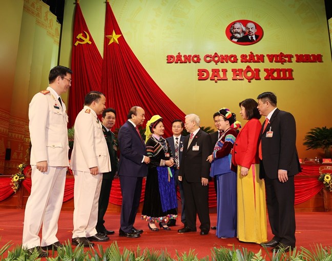 Tổng Bí thư Nguyễn Phú Trọng với các đại biểu tham dự Đại hội đại biểu toàn quốc lần thứ XIII của Đảng_Ảnh: TTXVN